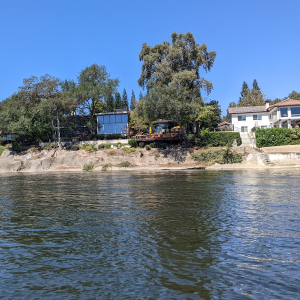 You will see many fancy houses on top of a concrete wall on your right. This is in the indication that you're approaching the end of the ride.